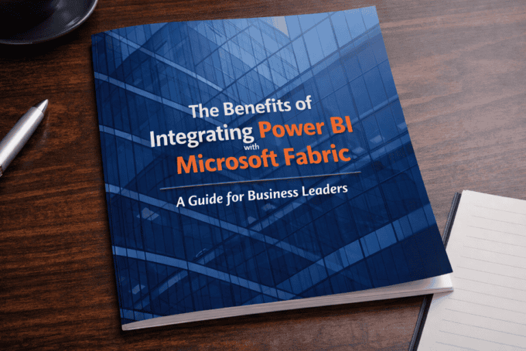 A booklet titled "The Benefits of Integrating Power BI with Microsoft Fabric: A Guide for Business Leaders" rests on a wooden desk beside a pen and a notebook, providing insights for business leaders seeking data-driven success.